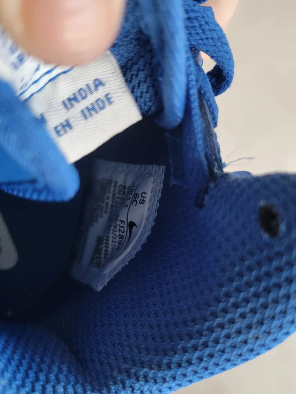 Nike Kids Blue and White Low-Top Sneakers with Gold Accents